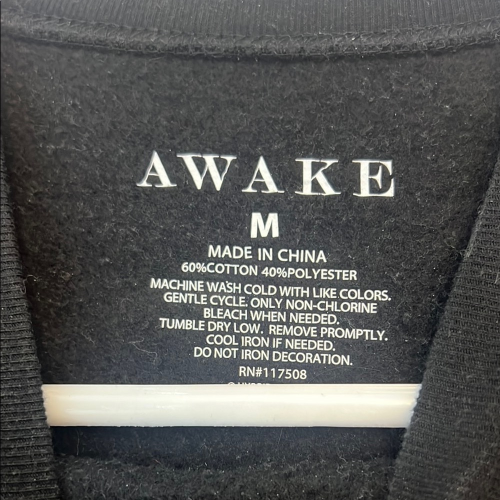 Awake Black Crewneck Sweater with Sunflower Graphic - Picture 2 of 11